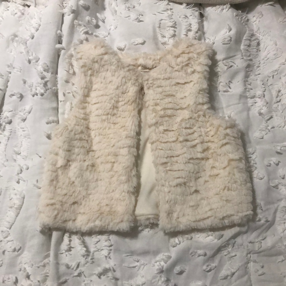 White sweater vest